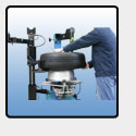 A Guide To Using A Wheel Clamp Tire Changer