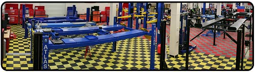 This is a picture of our 4-post auto lift area of our showroom. Shown in this picture are the four post lift, storage lift, the atlas pro floor storage system, and the rolling bridge jacks or projacks.